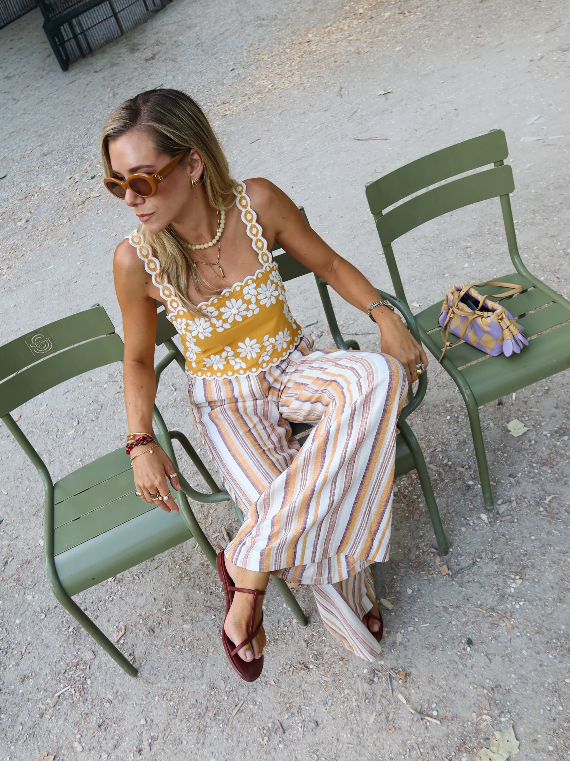 yellow floral top with striped wide-leg trousers