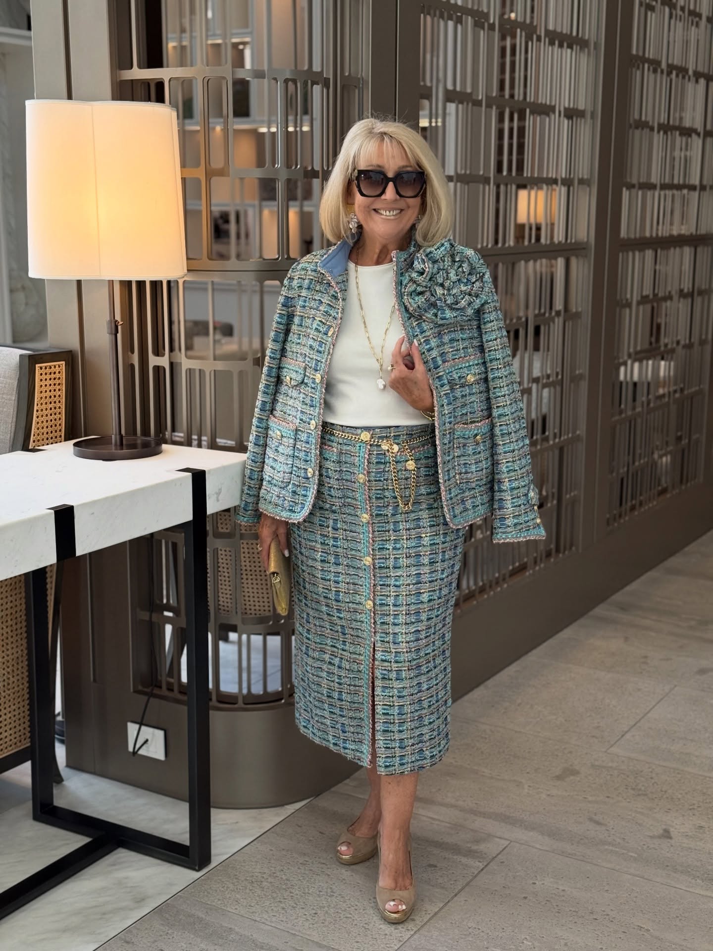 blue tweed skirt suit in a flattering color for women over 40