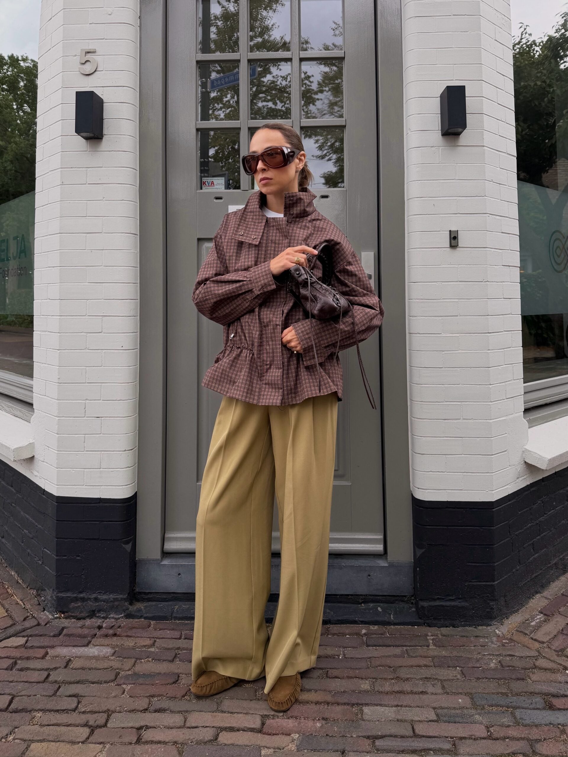 modern checked jacket with mustard wide-leg trousers