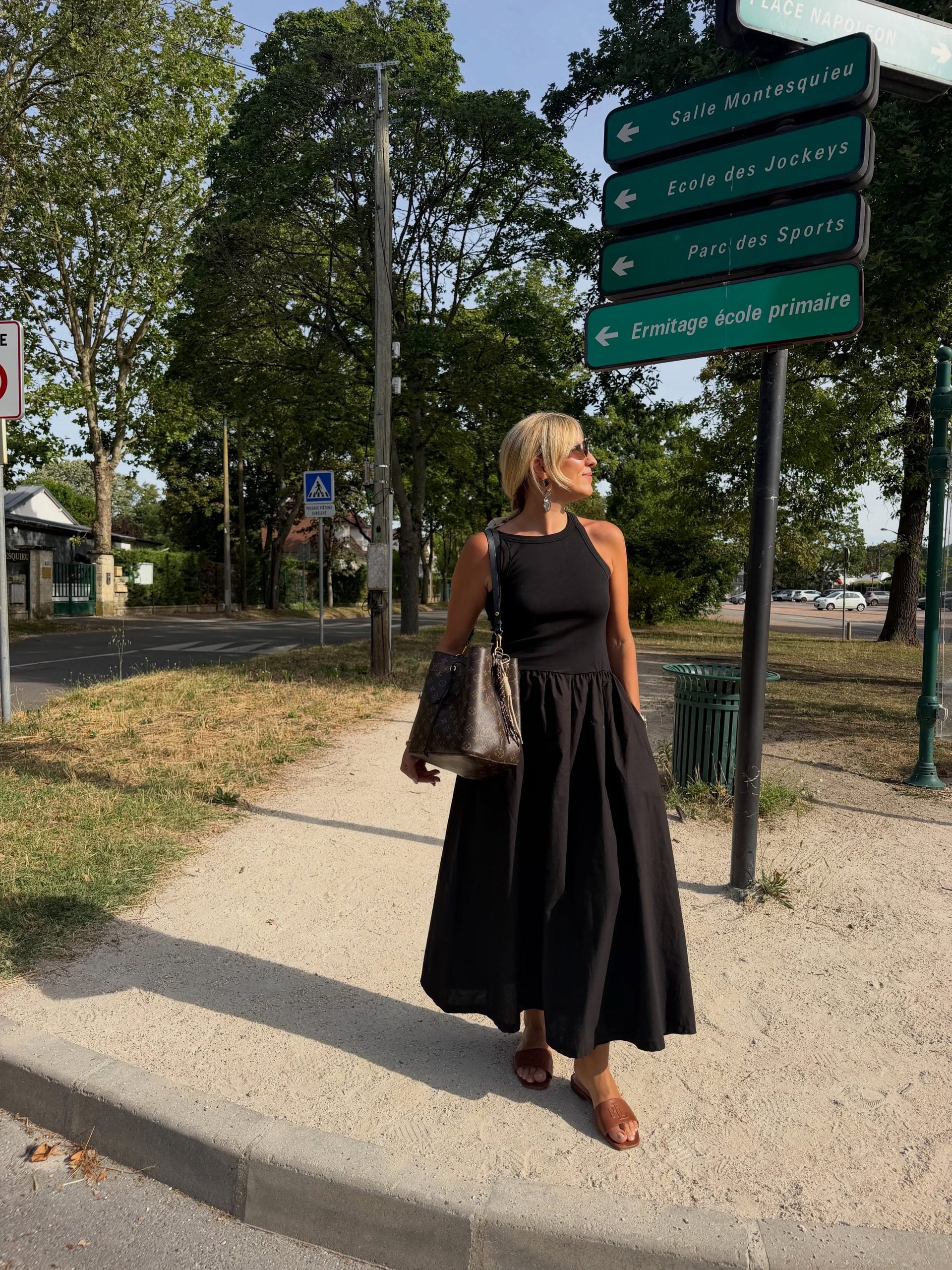black maxi dress with flat sandals for women over 40