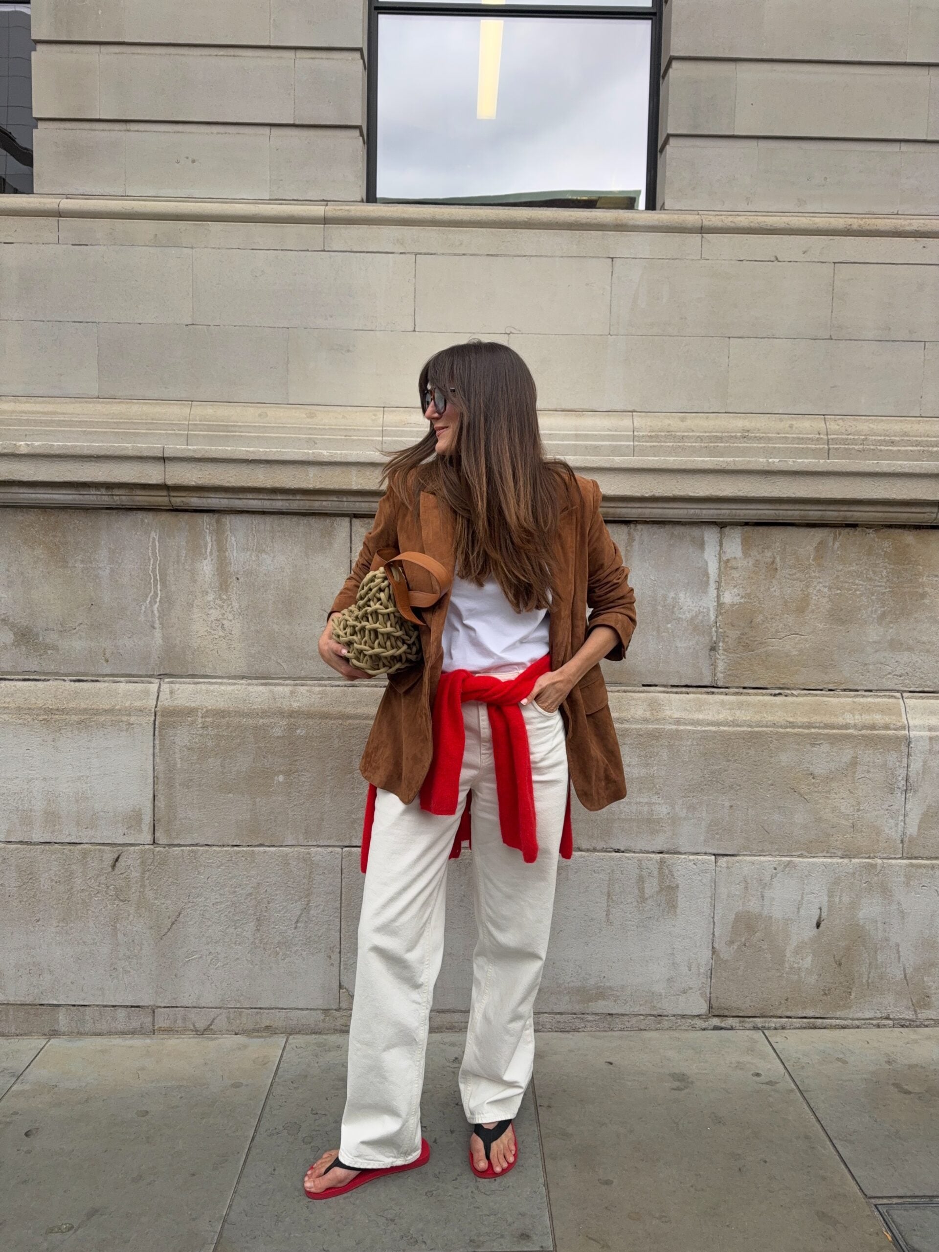 brown blazer with white trousers and red accessories for women over 40