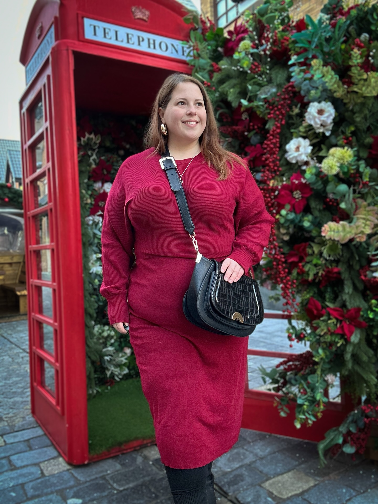 Plus size burgundy Christmas outfit with matching sweater and midi skirt
