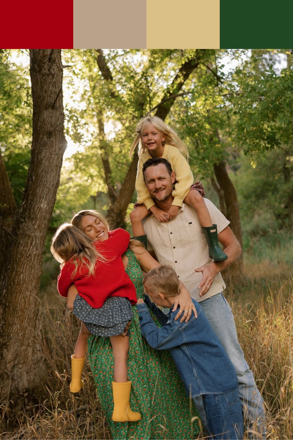 Family of five in rust red, mustard, forest green and taupe outfits during a playful outdoor fall photoshoot