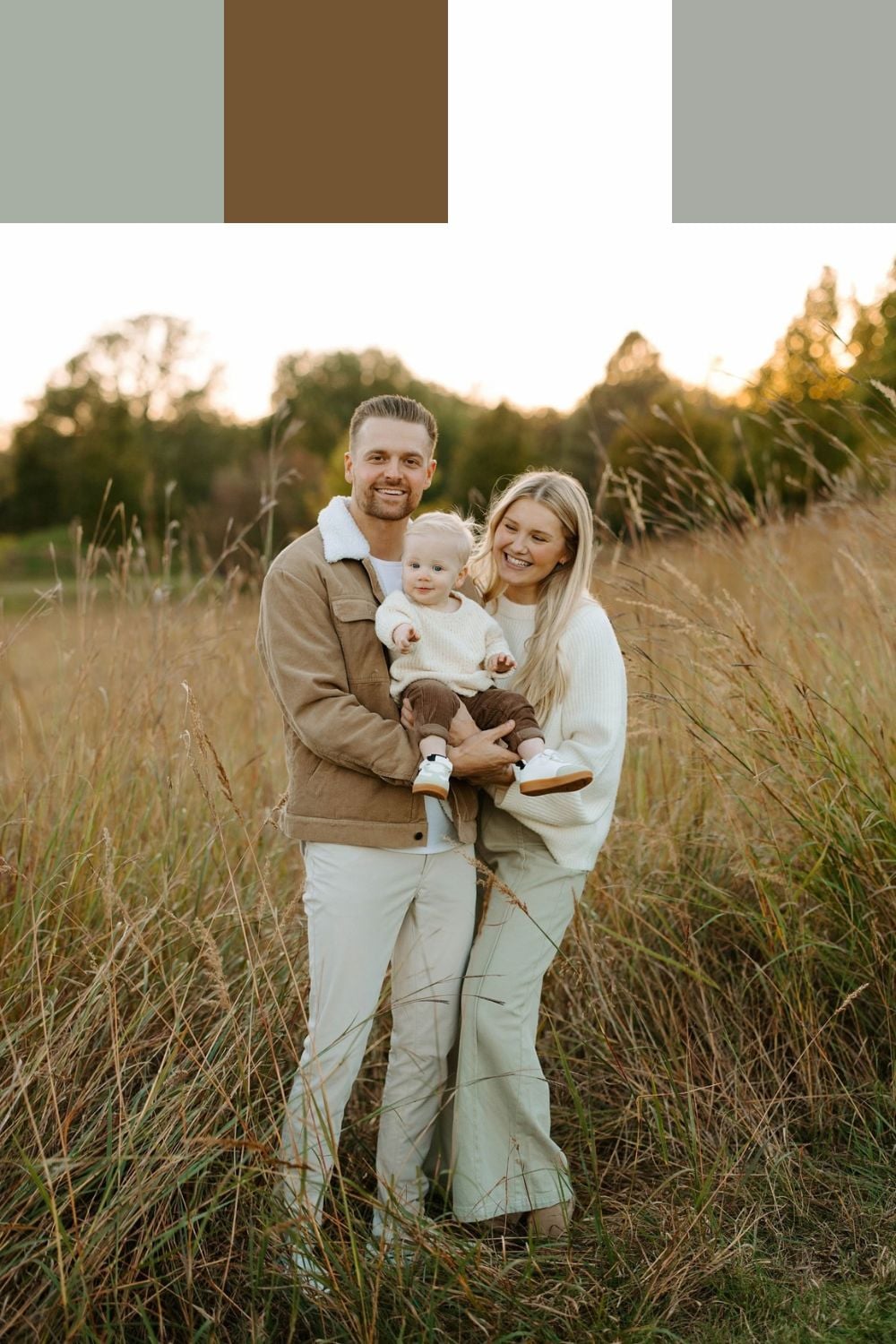 Family of three wearing cream, camel and pale sage outfits, with both parents in trousers and their baby in a knit sweater
